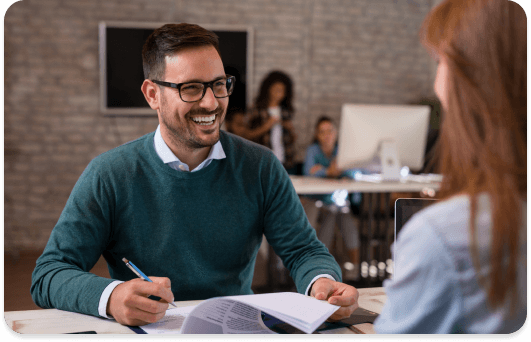 Man laughing with woman